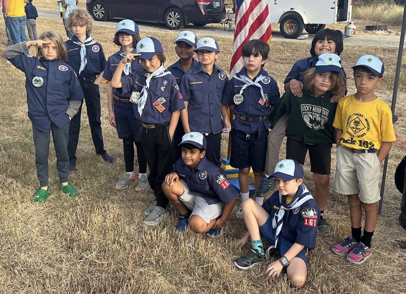 Pack 162 scouts in both Class A uniform shirts and Class B pack t-shirts